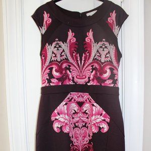 Figure-flattering purple and pink dress